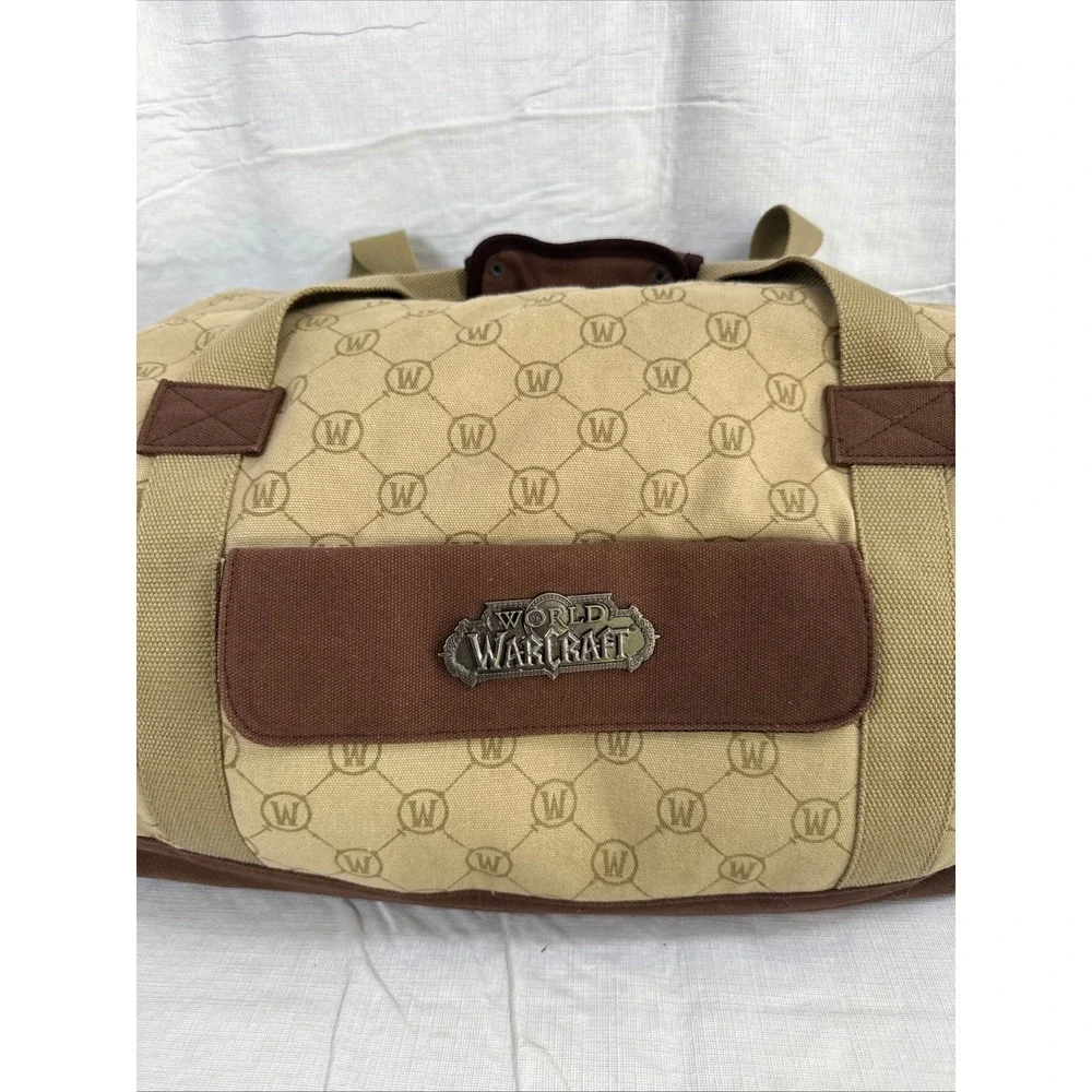 World of Warcraft Blizzard Entertainment Duffle Bag B63131 Tan Brown Logo